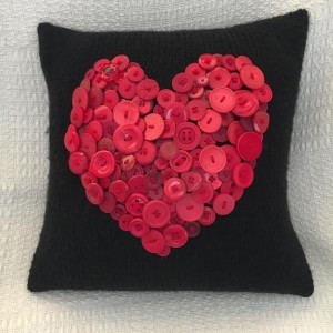 Black and red button heart pillow