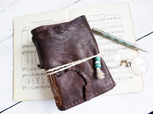 Earthy brown leather journal handbound and stained paper