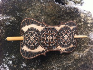 Violin shaped hand carved leather hair barrette